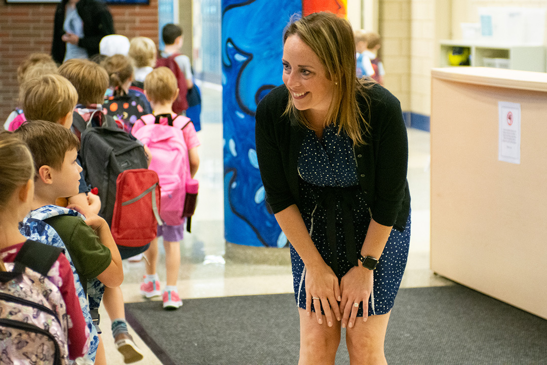 The first day of school certainly feels easier when your principal is waiting for you with a smile.